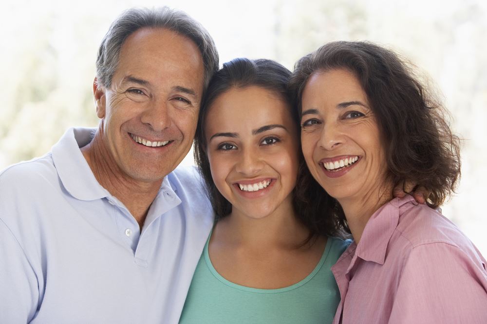 Couple With Their Teenage Daughter